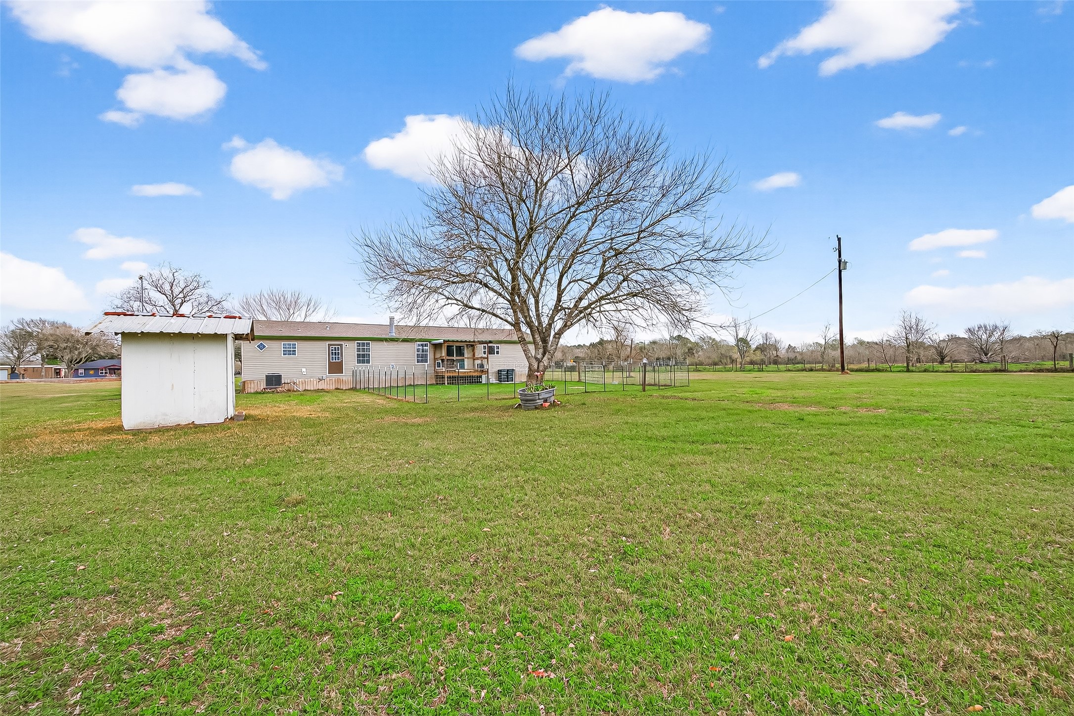 9820 Oberrender Road Needville, TX 77461 - Photo 29 of 30 a view of a house with a big yard