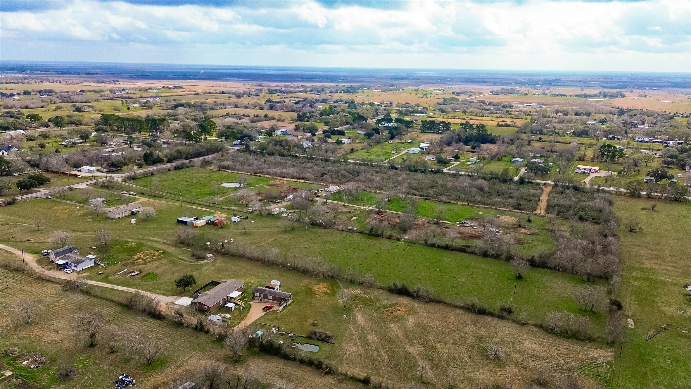 9820 Oberrender Road Needville, TX 77461 - Photo 5 of 30 an aerial view of a city with mountains