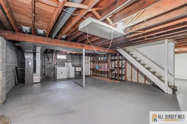 a view of an empty room with wooden roof