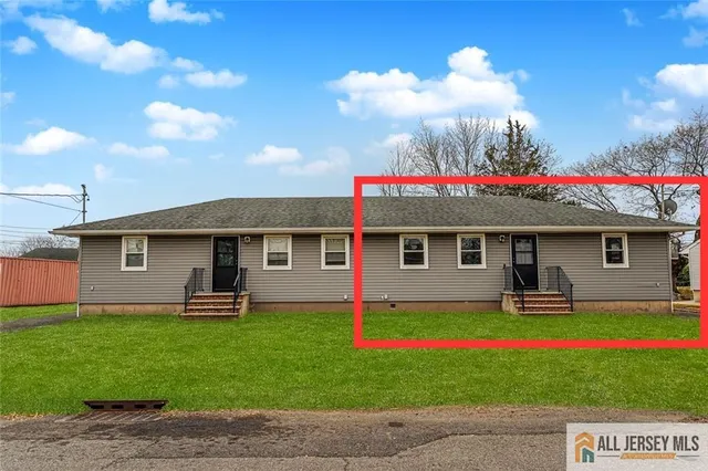 a front view of a house with patio
