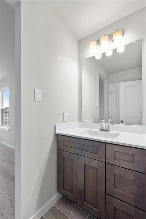 332 Stellar Wind Drive Georgetown, TX 78628 - Photo 5 of 29 Clean lines define this bathroom with a contemporary vanity and ample mirror space.