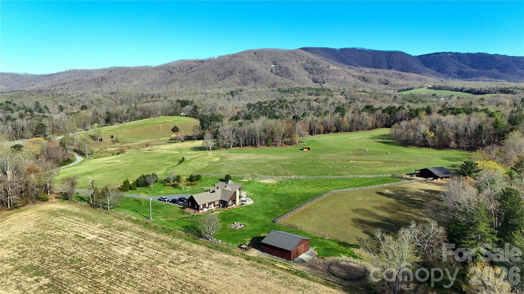 1083 Union Community Road Thurmond, NC 28683 - Photo 39 of 47 a view of a lush green hillside and houses