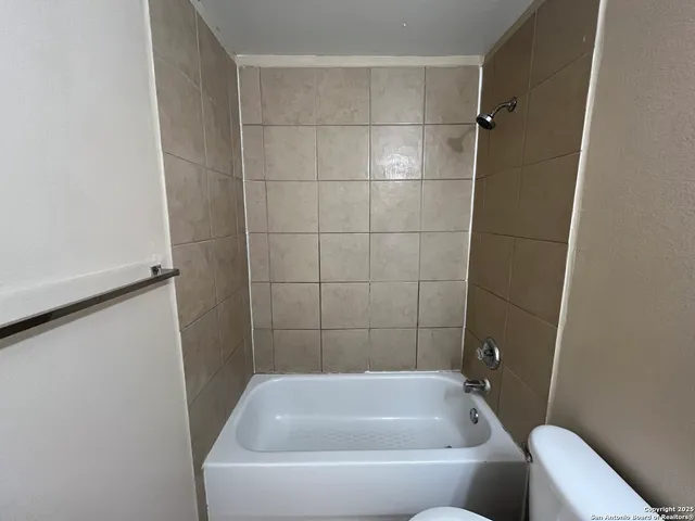 a bathroom with a bathtub