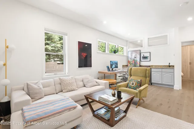 a living room with furniture or couch and a window