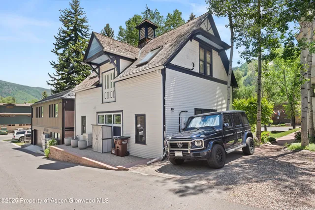 a car parked in front of house