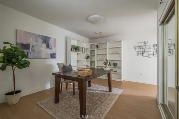 a kitchen with stainless steel appliances a sink stove and cabinets