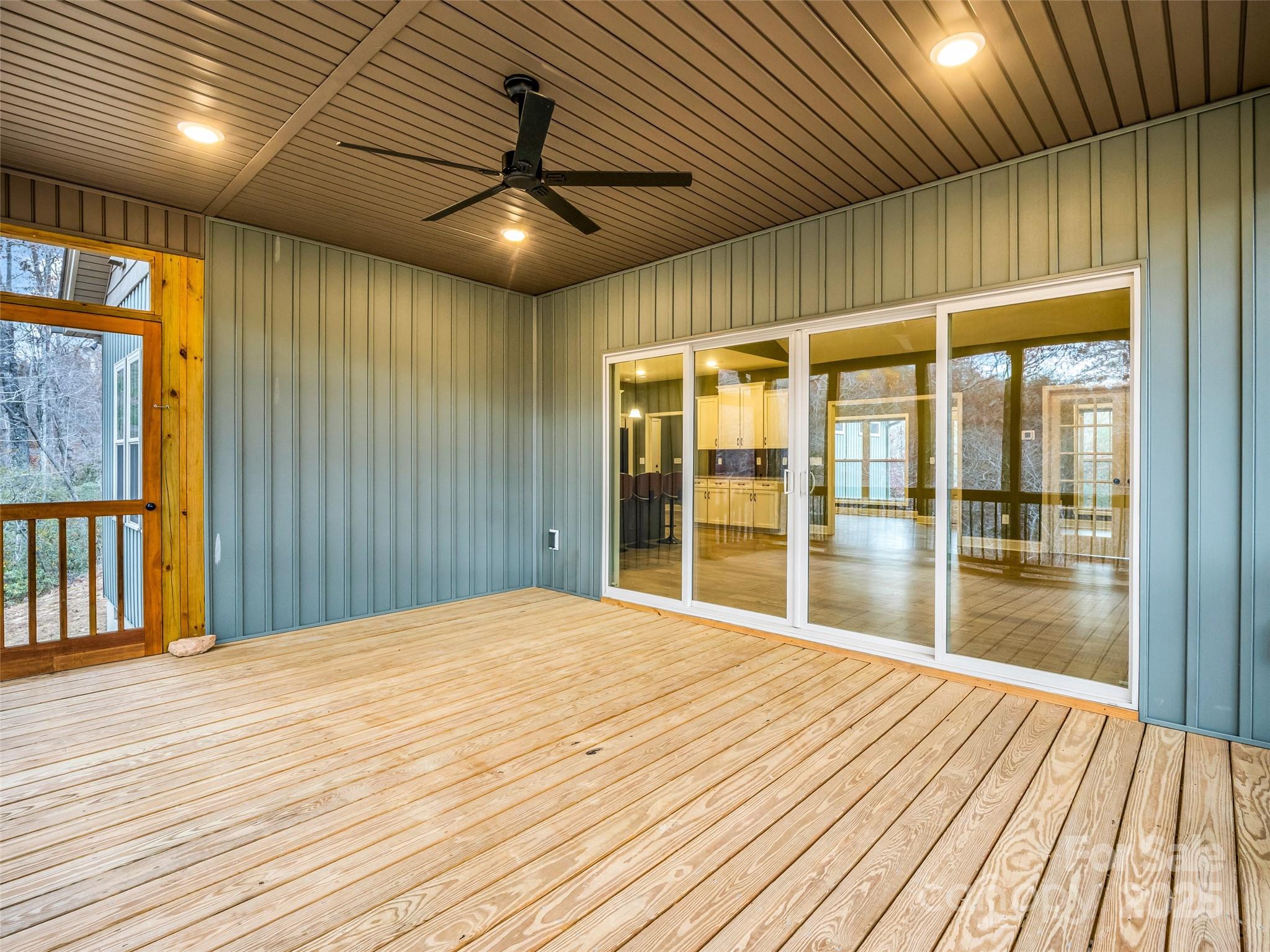 140 Cv Crst Drive Rutherfordton, NC 28139 - Photo 37 of 48 a view of an empty room with wooden floor and a window