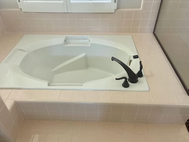 a bathroom with a bathtub