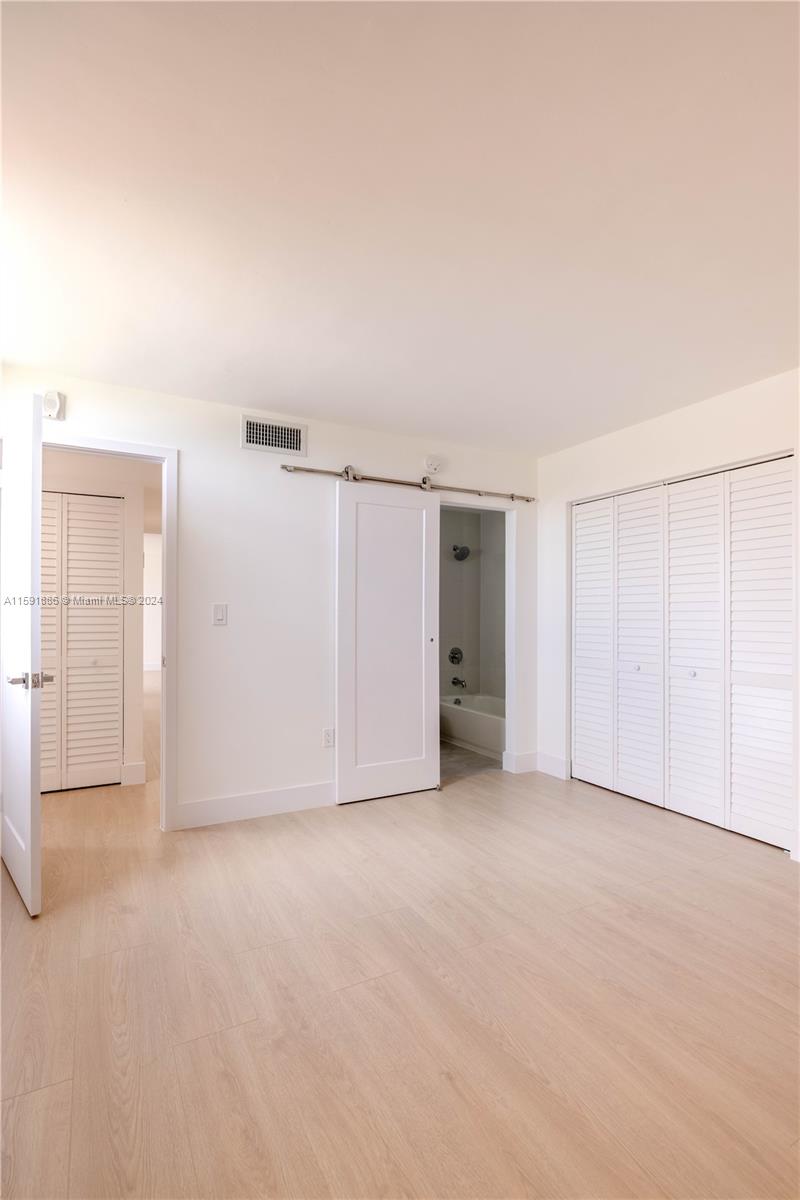 9400 West Flagler Street, Unit 413 Miami, FL 33174 - Photo 11 of 17 an empty room with closet
