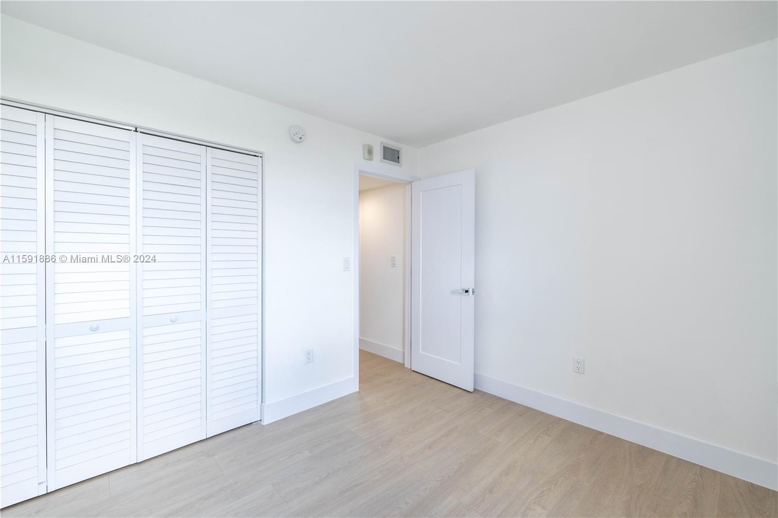 9400 West Flagler Street, Unit 413 Miami, FL 33174 - Photo 14 of 17 a view of an empty room