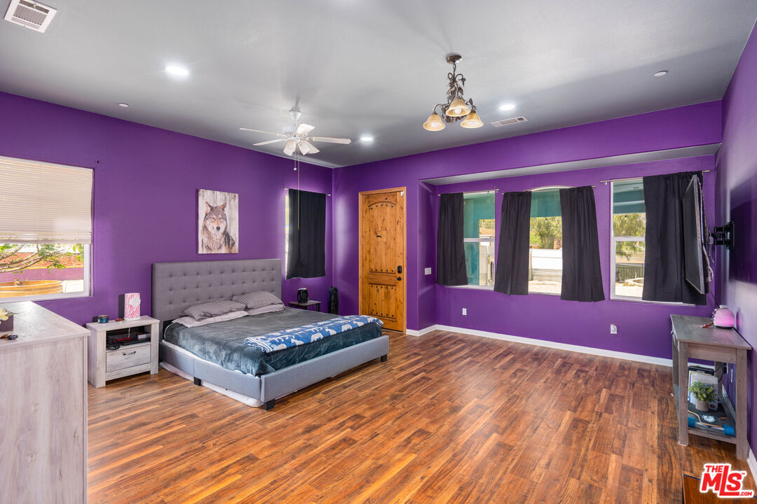 34545 Juniper Valley Road Acton, CA 93510 - Photo 15 of 34 a living room with hard wood flooring and furniture