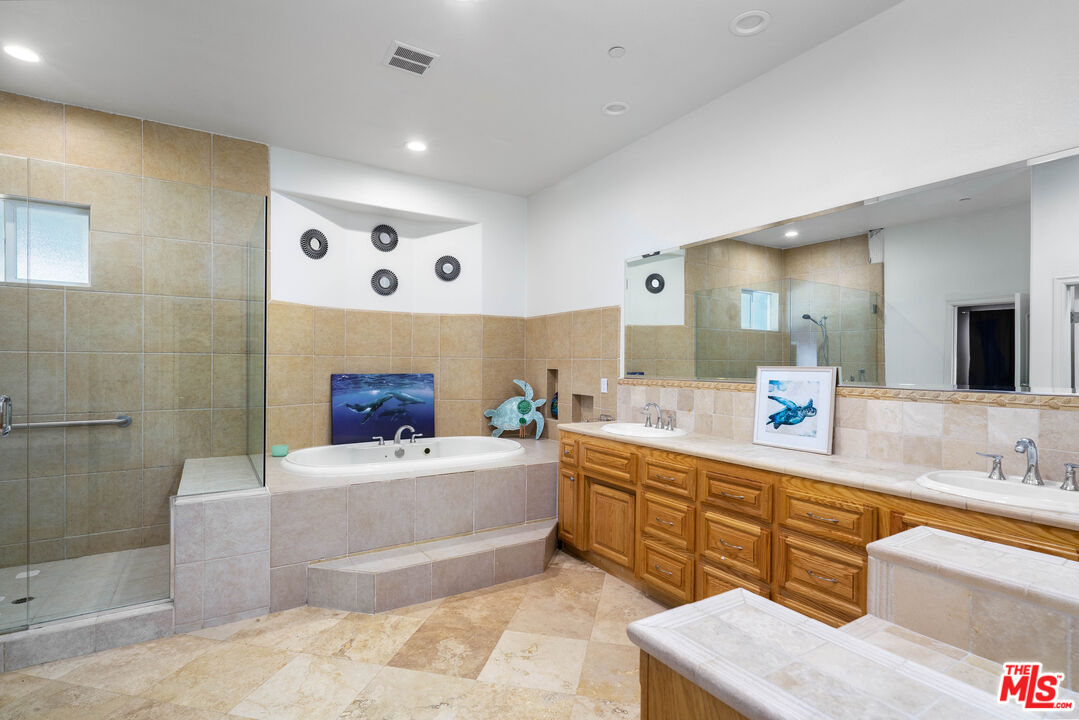 34545 Juniper Valley Road Acton, CA 93510 - Photo 17 of 34 a large living room with a large tub and sink