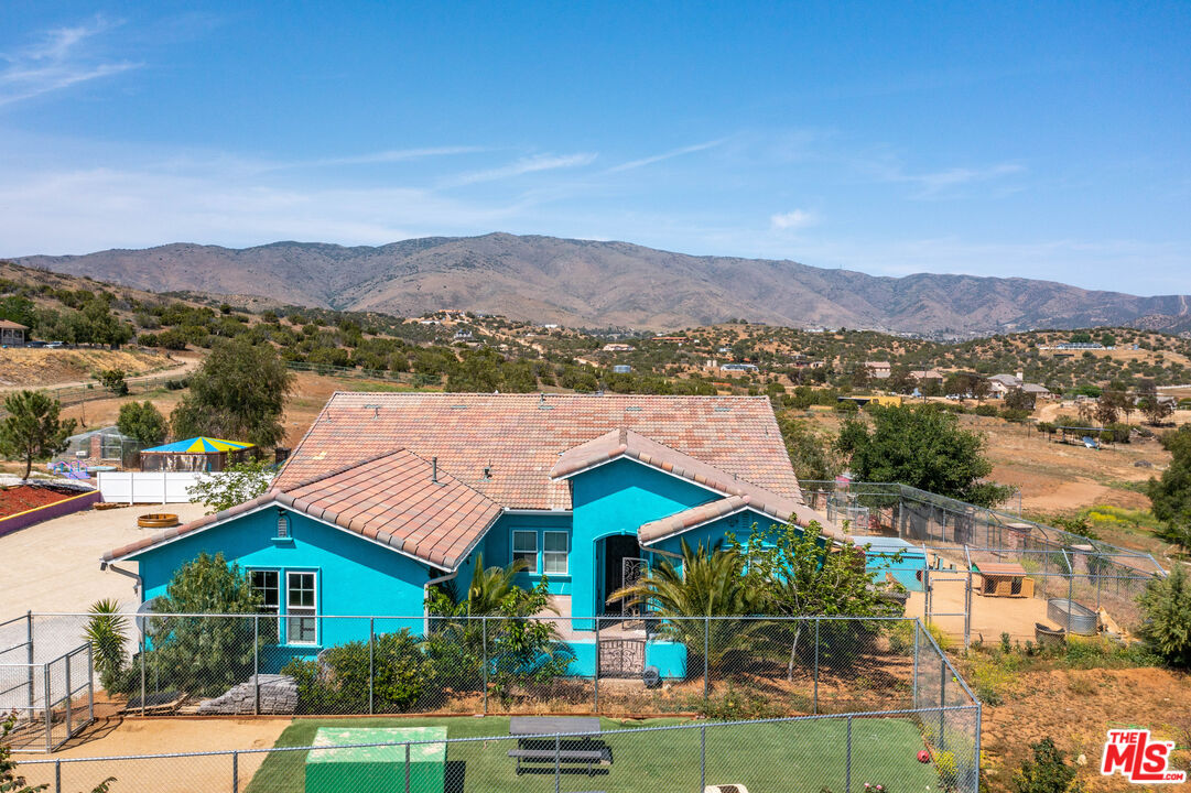 34545 Juniper Valley Road Acton, CA 93510 - Photo 3 of 34 a view of house with outdoor space and mountains