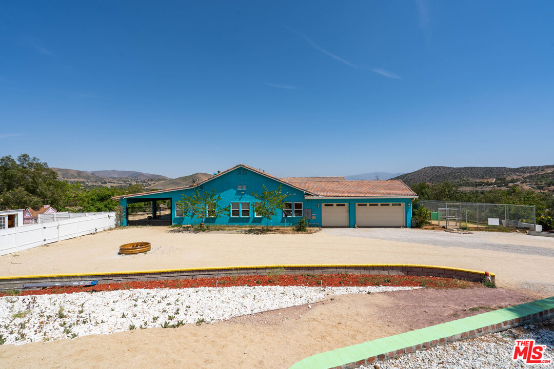 34545 Juniper Valley Road Acton, CA 93510 - Photo 32 of 34 a front view of a house with a yard