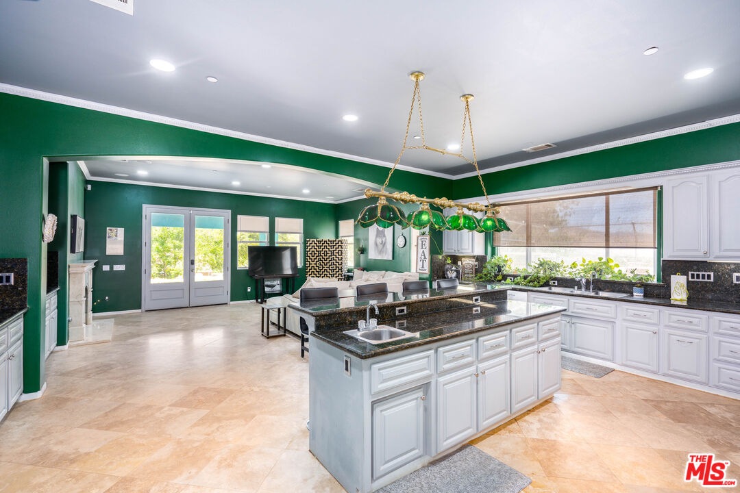 34545 Juniper Valley Road Acton, CA 93510 - Photo 5 of 34 a kitchen with kitchen island stainless steel appliances a large window in it