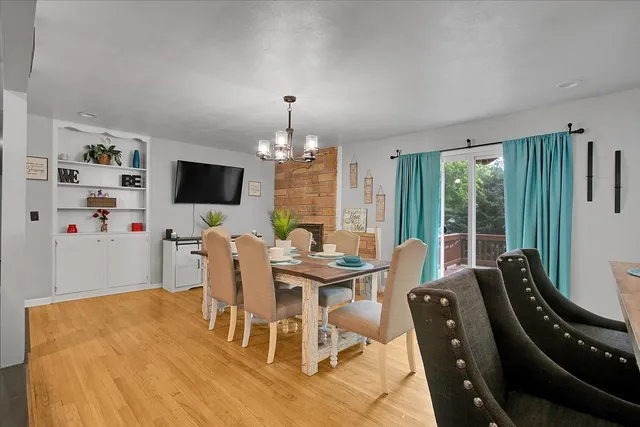 a view of a dining room with furniture window and outside view