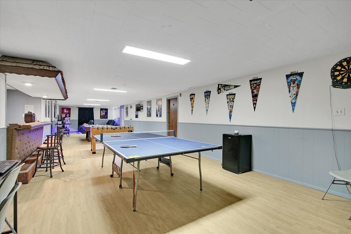 1708 Montague Road Rockford, IL 61102 - Photo 28 of 39 a living room with lots of furniture and view of kitchen