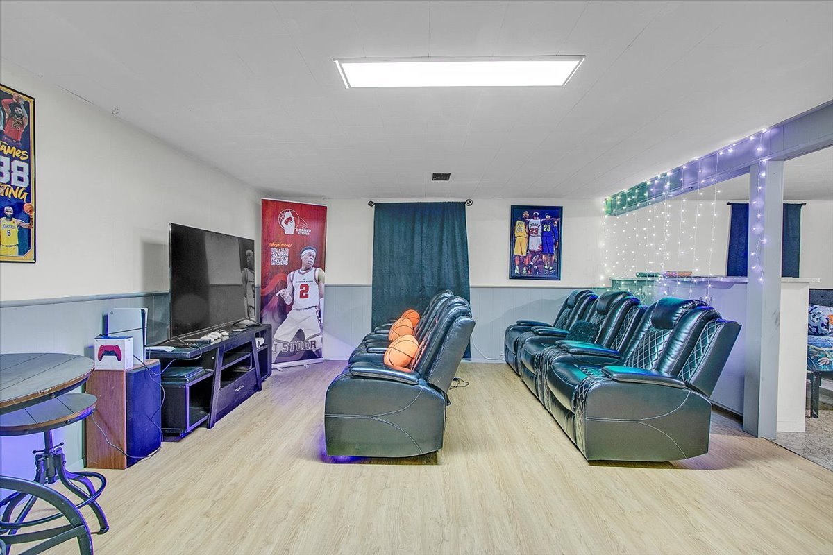 1708 Montague Road Rockford, IL 61102 - Photo 31 of 39 a living room with furniture and a flat screen tv