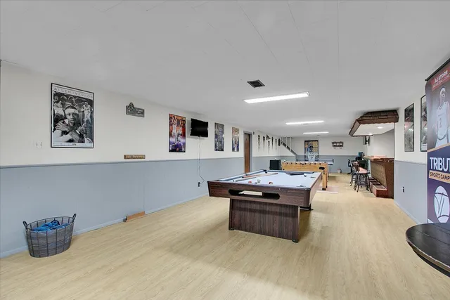 a room with furniture and a flat screen tv