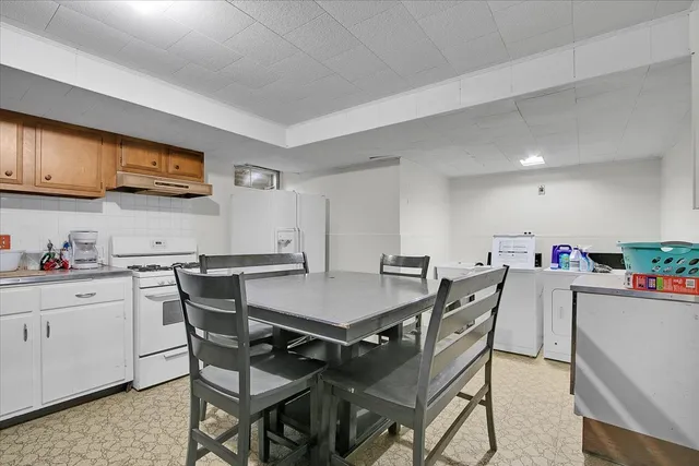 a view of a dining room with furniture