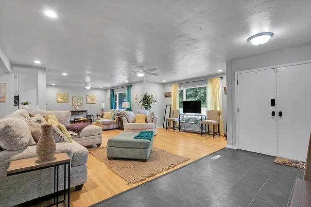 a living room with furniture and a table