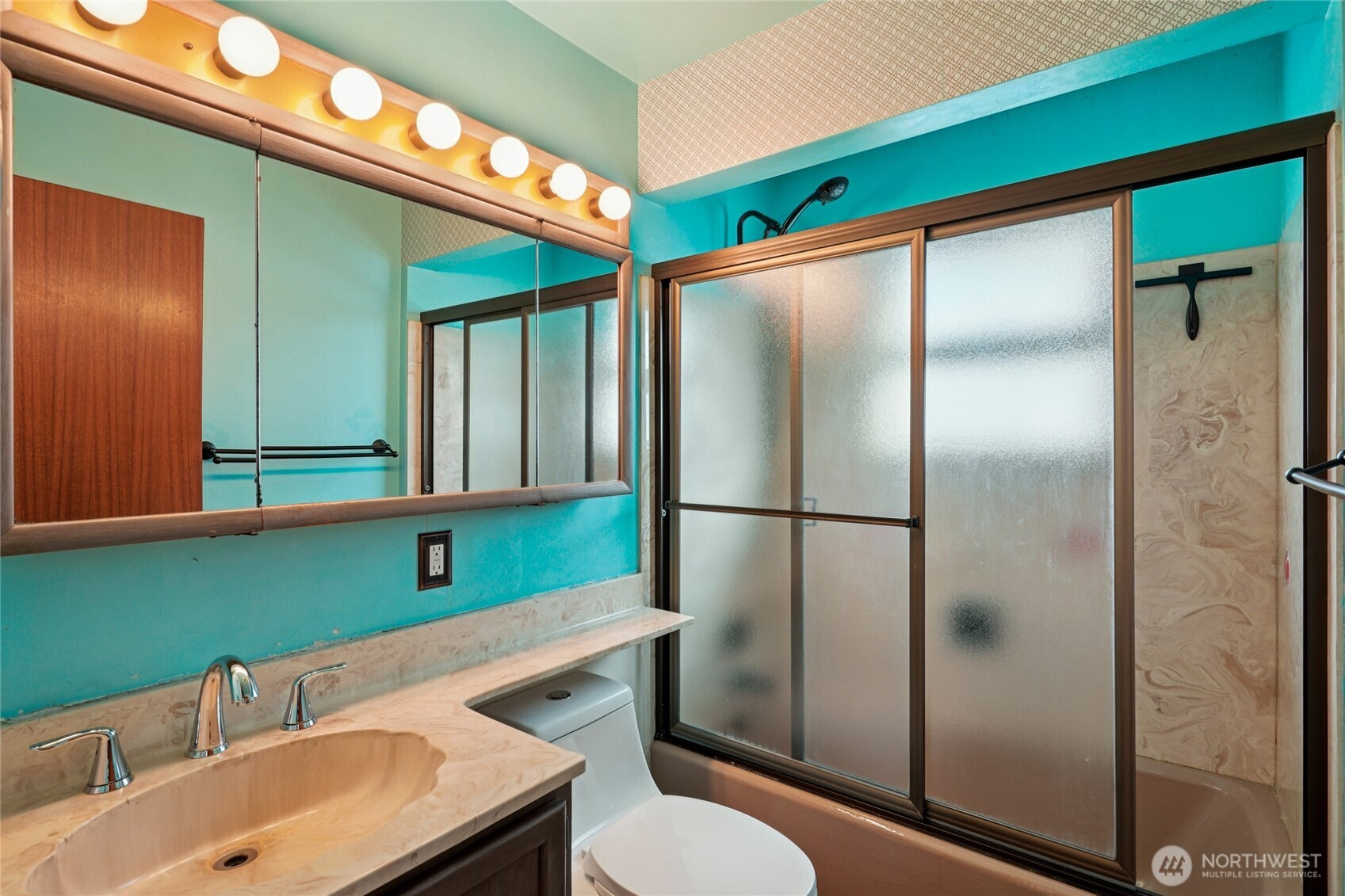 6628 Flora Avenue South Seattle, WA 98108 - Photo 16 of 32 a bathroom with a sink toilet and shower