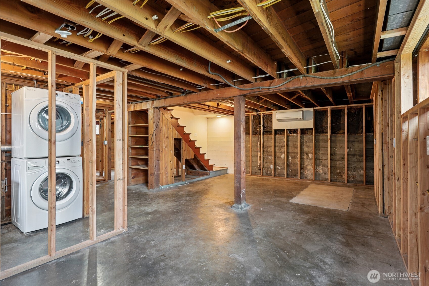 6628 Flora Avenue South Seattle, WA 98108 - Photo 18 of 32 a view of an empty room with wooden floor