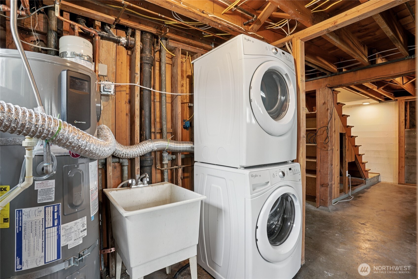 6628 Flora Avenue South Seattle, WA 98108 - Photo 21 of 32 a utility room with dryer and washer