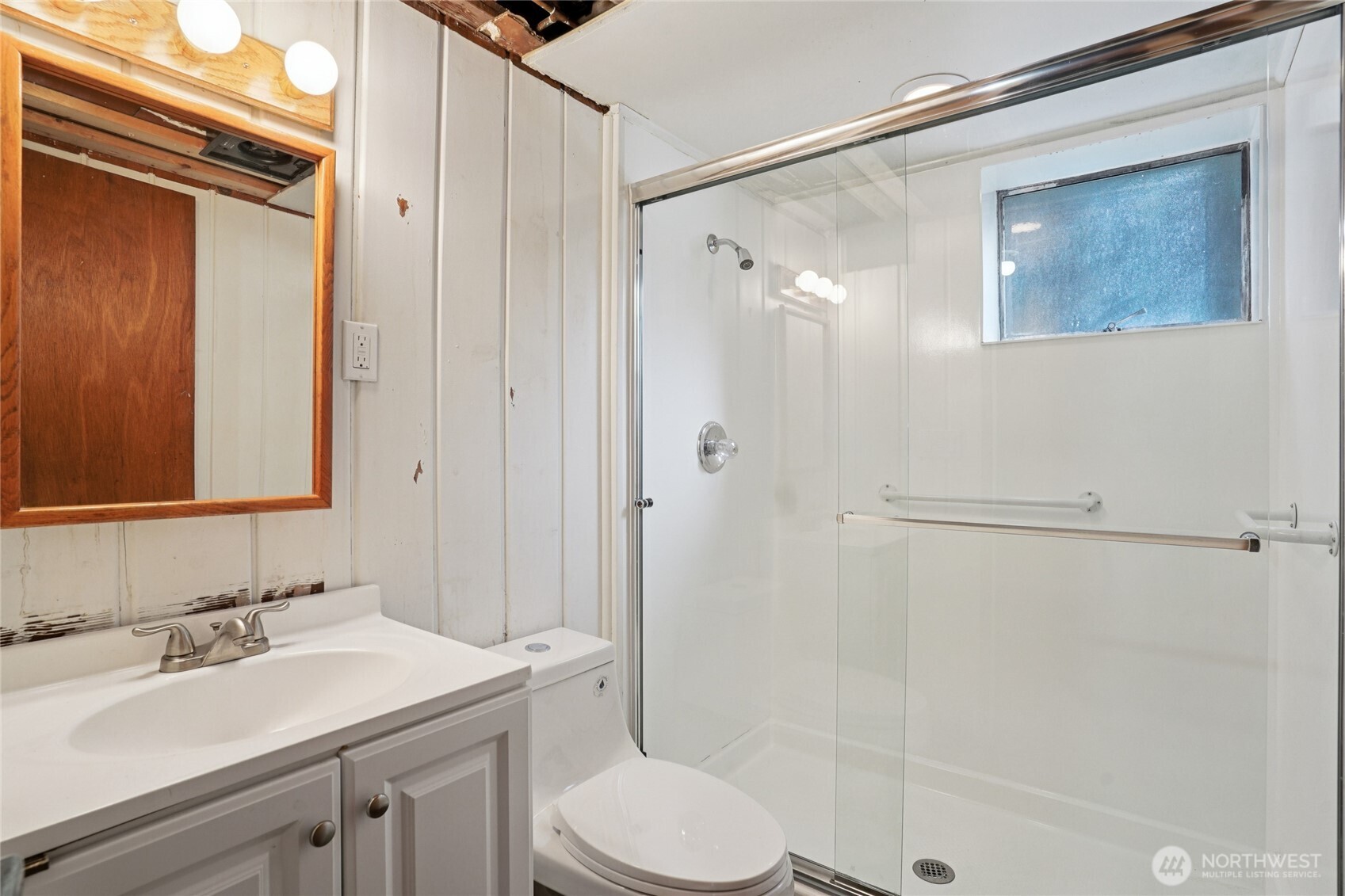 6628 Flora Avenue South Seattle, WA 98108 - Photo 22 of 32 a bathroom with a sink toilet and shower