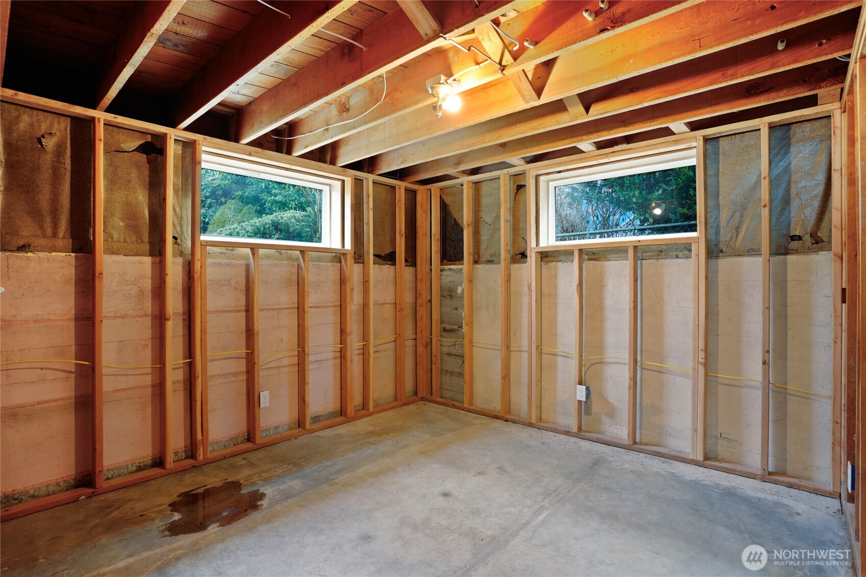 6628 Flora Avenue South Seattle, WA 98108 - Photo 23 of 32 a view of a door with wooden walls
