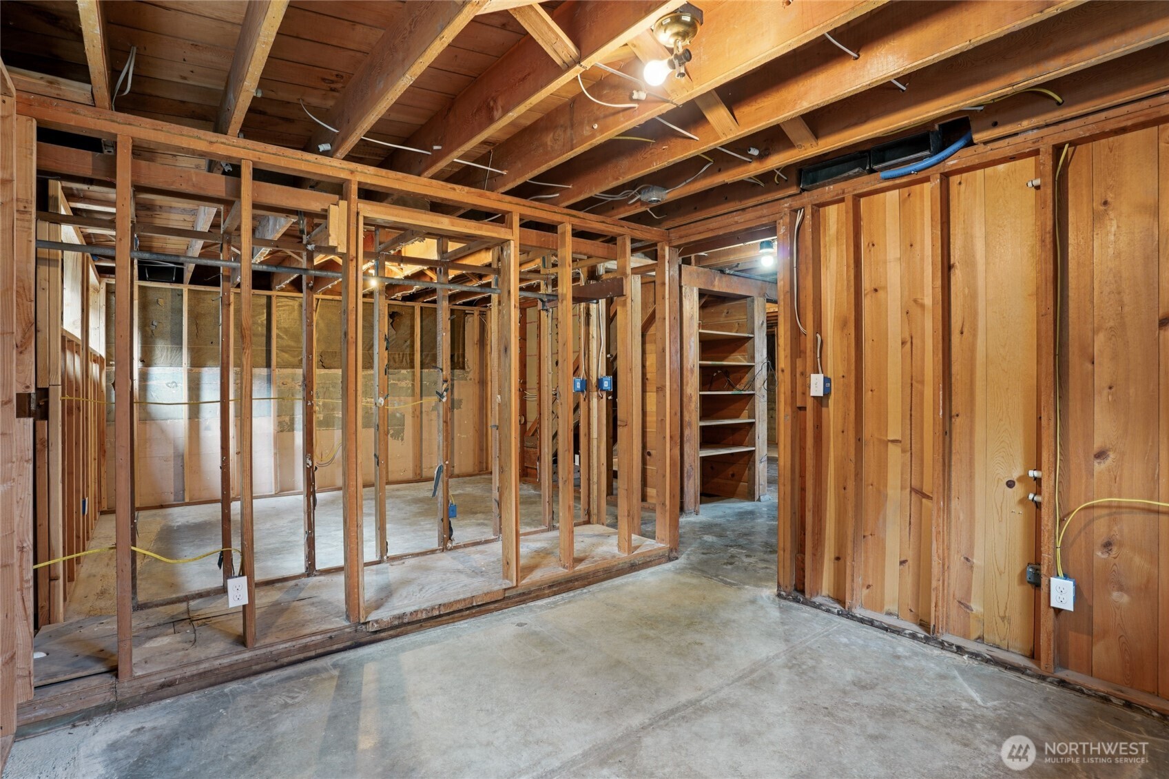 6628 Flora Avenue South Seattle, WA 98108 - Photo 24 of 32 a view of an empty room with wooden walls