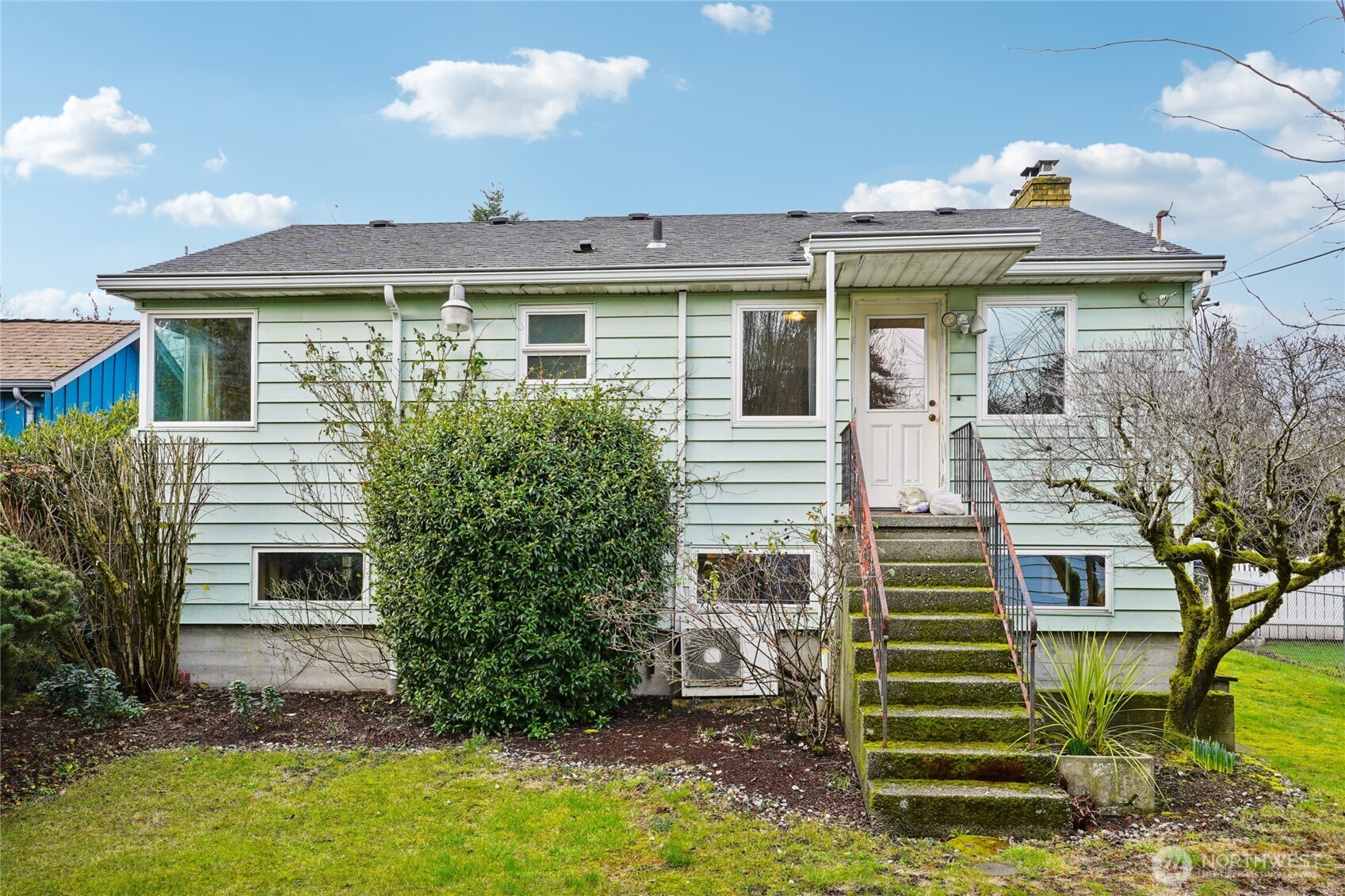 6628 Flora Avenue South Seattle, WA 98108 - Photo 27 of 32 a front view of a house with a yard