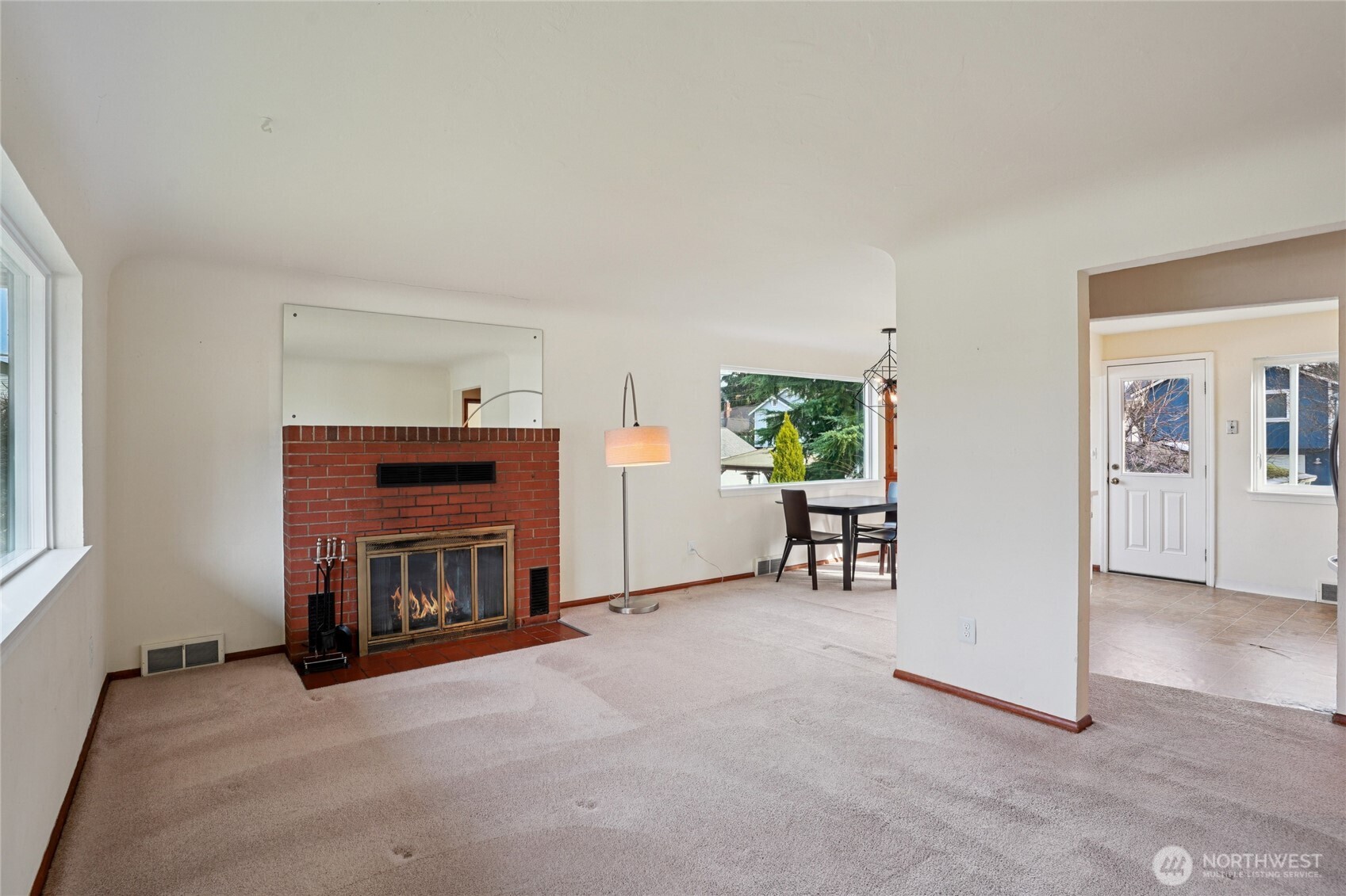 6628 Flora Avenue South Seattle, WA 98108 - Photo 4 of 32 a view of a livingroom with furniture and a fireplace