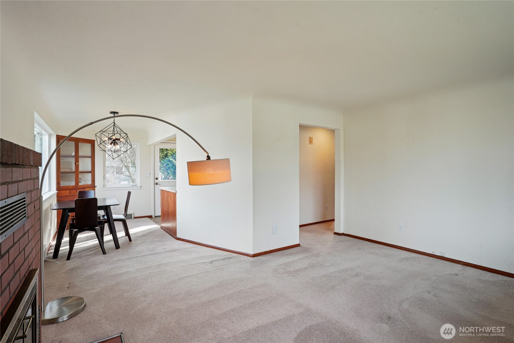 6628 Flora Avenue South Seattle, WA 98108 - Photo 5 of 32 a view of an empty room with furniture and a window