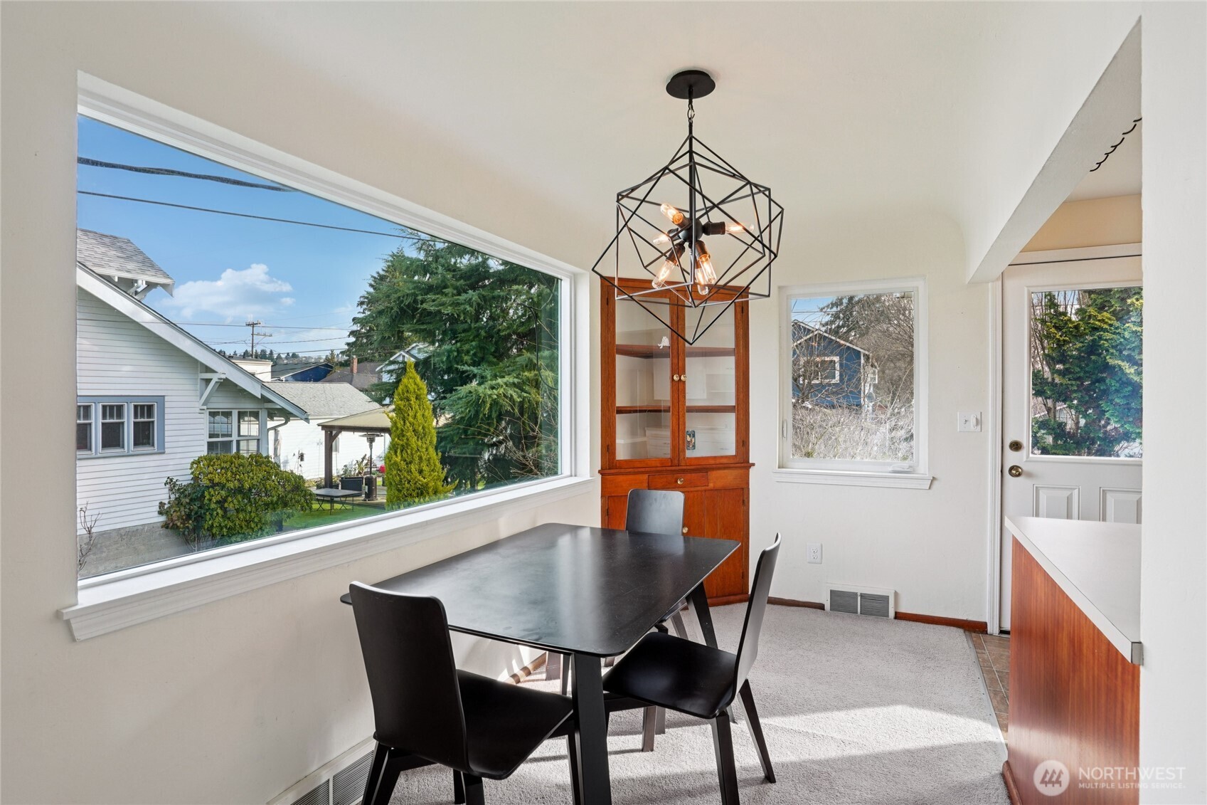 6628 Flora Avenue South Seattle, WA 98108 - Photo 6 of 32 a view of a dining room with furniture window and outside view