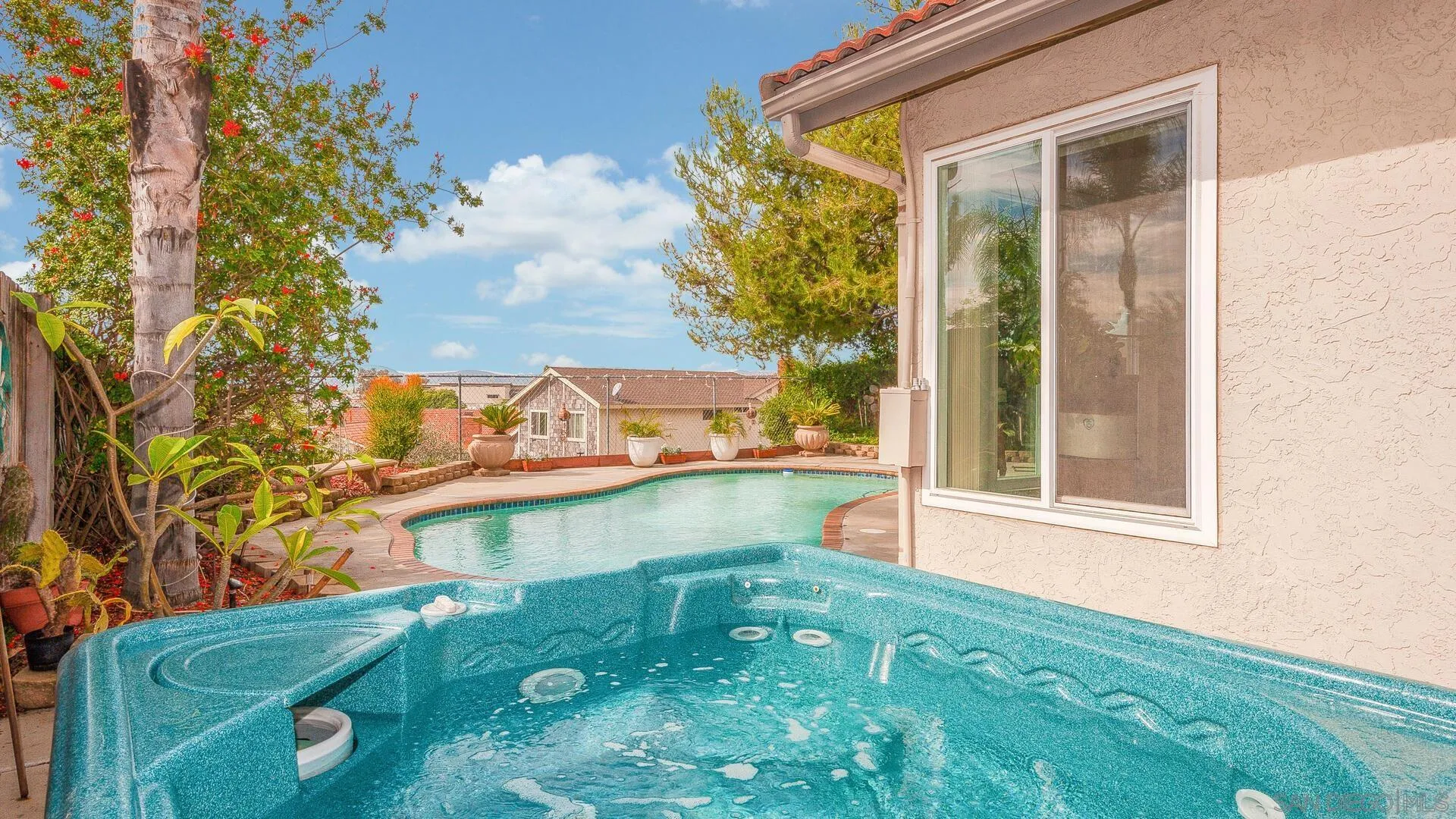 9648 Ramsgate Way Santee, CA 92071 - Photo 32 of 42 view of a backyard with a garden