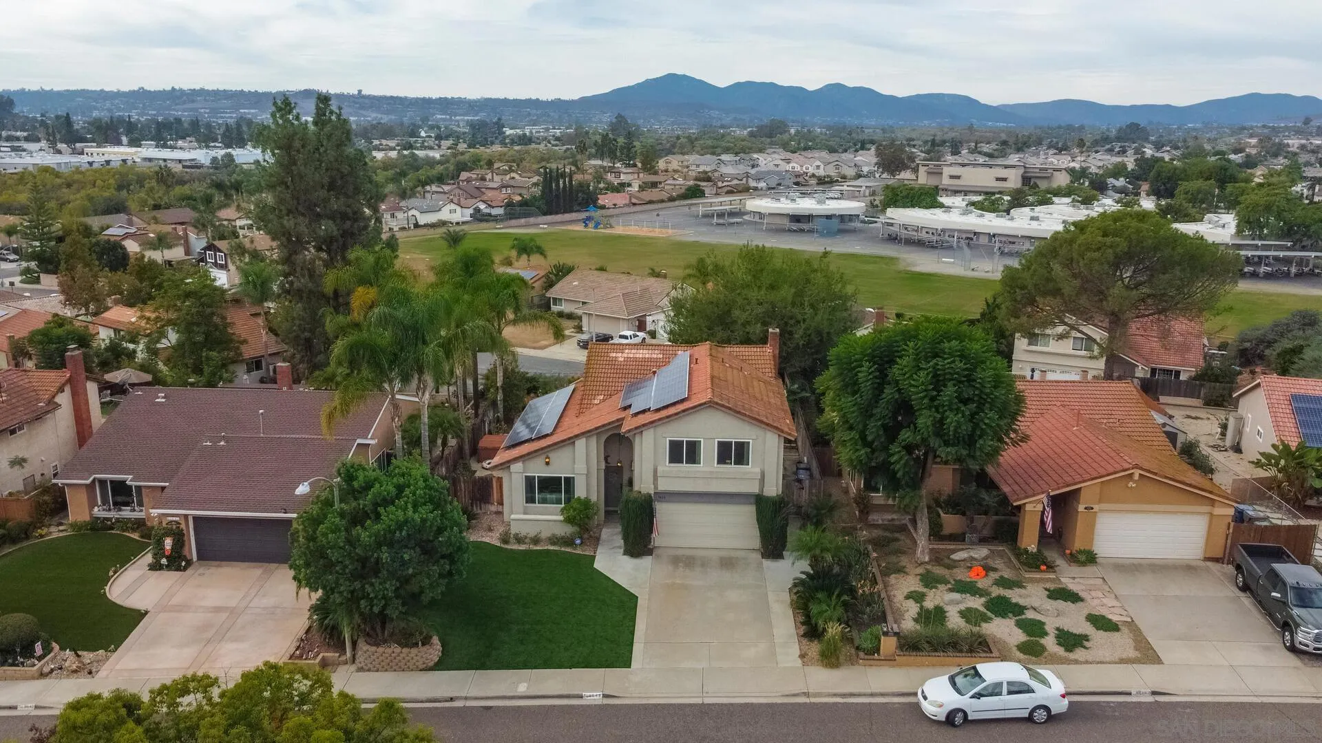 9648 Ramsgate Way Santee, CA 92071 - Photo 36 of 42 an aerial view of a house with a lake view