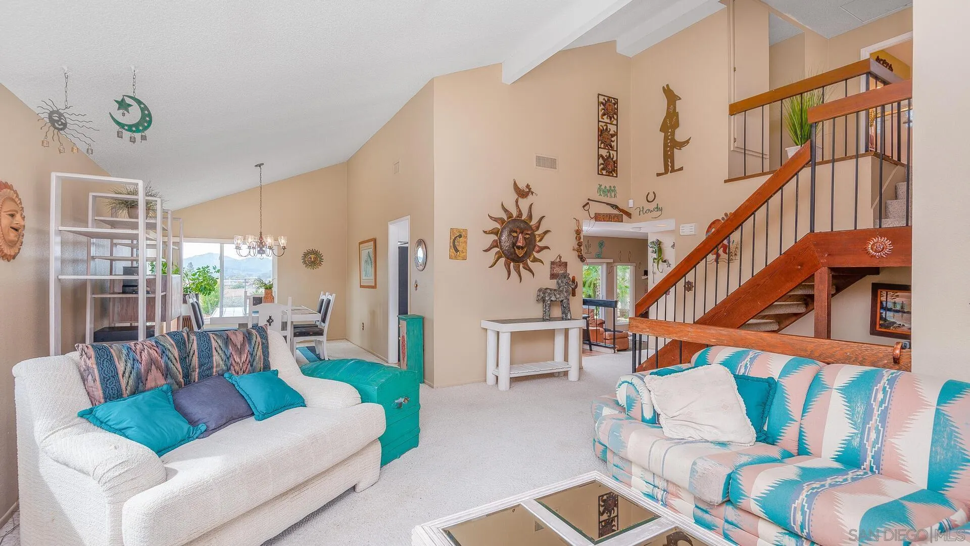 9648 Ramsgate Way Santee, CA 92071 - Photo 4 of 42 a view of a livingroom with furniture and stairs