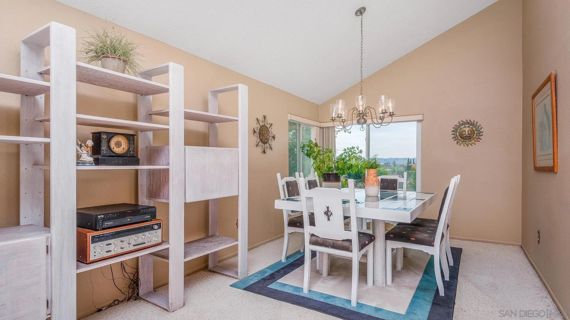 9648 Ramsgate Way Santee, CA 92071 - Photo 6 of 42 a view of a dining room with furniture and a potted plant