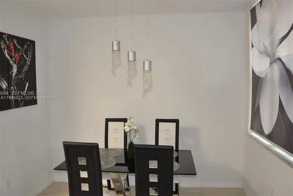 a view of a dining room with furniture