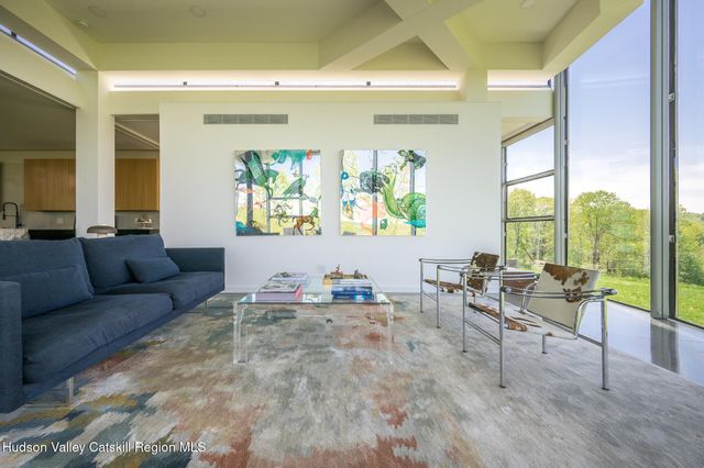 a kitchen with granite countertop lots of counter top space and dining table