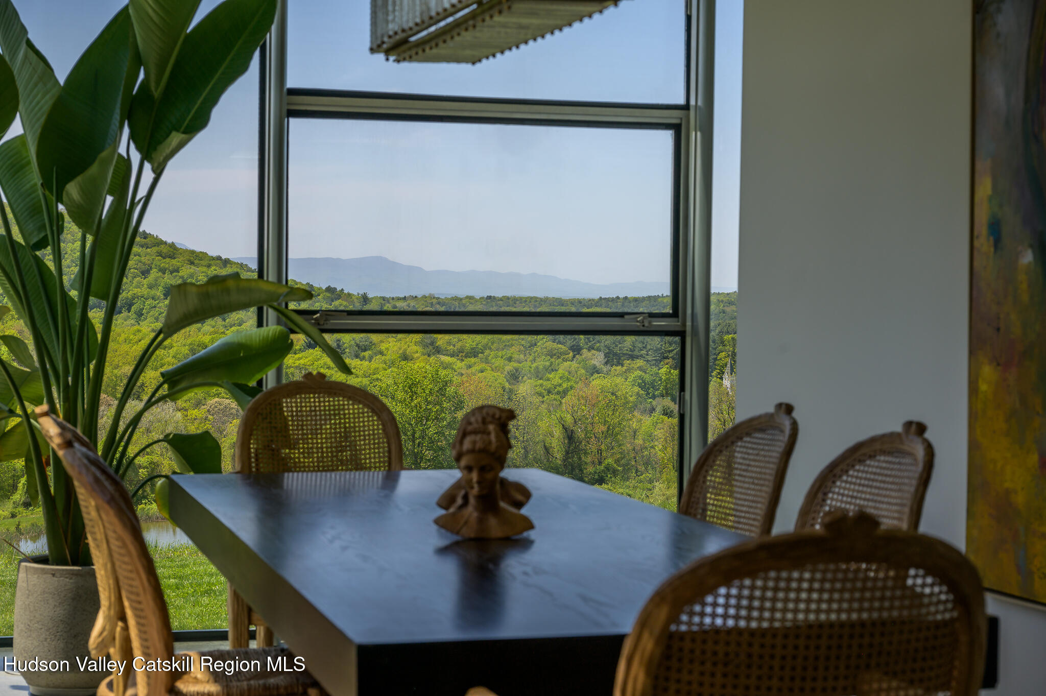 837 Carlson Road Craryville, NY 12521 - Photo 23 of 65 a view of a dining room with furniture and wooden floor