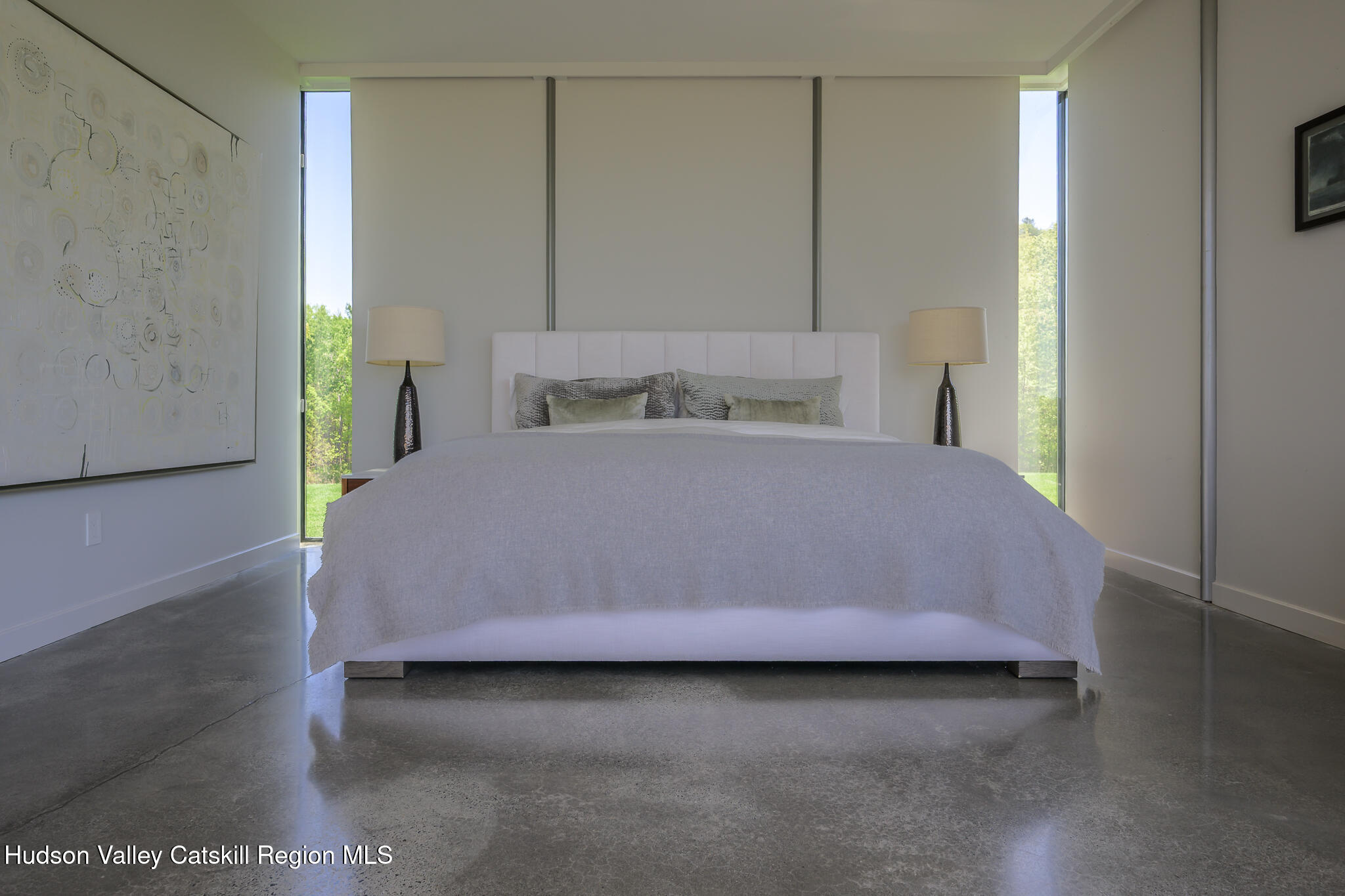 837 Carlson Road Craryville, NY 12521 - Photo 25 of 65 a large bed sitting in a bedroom next to a window