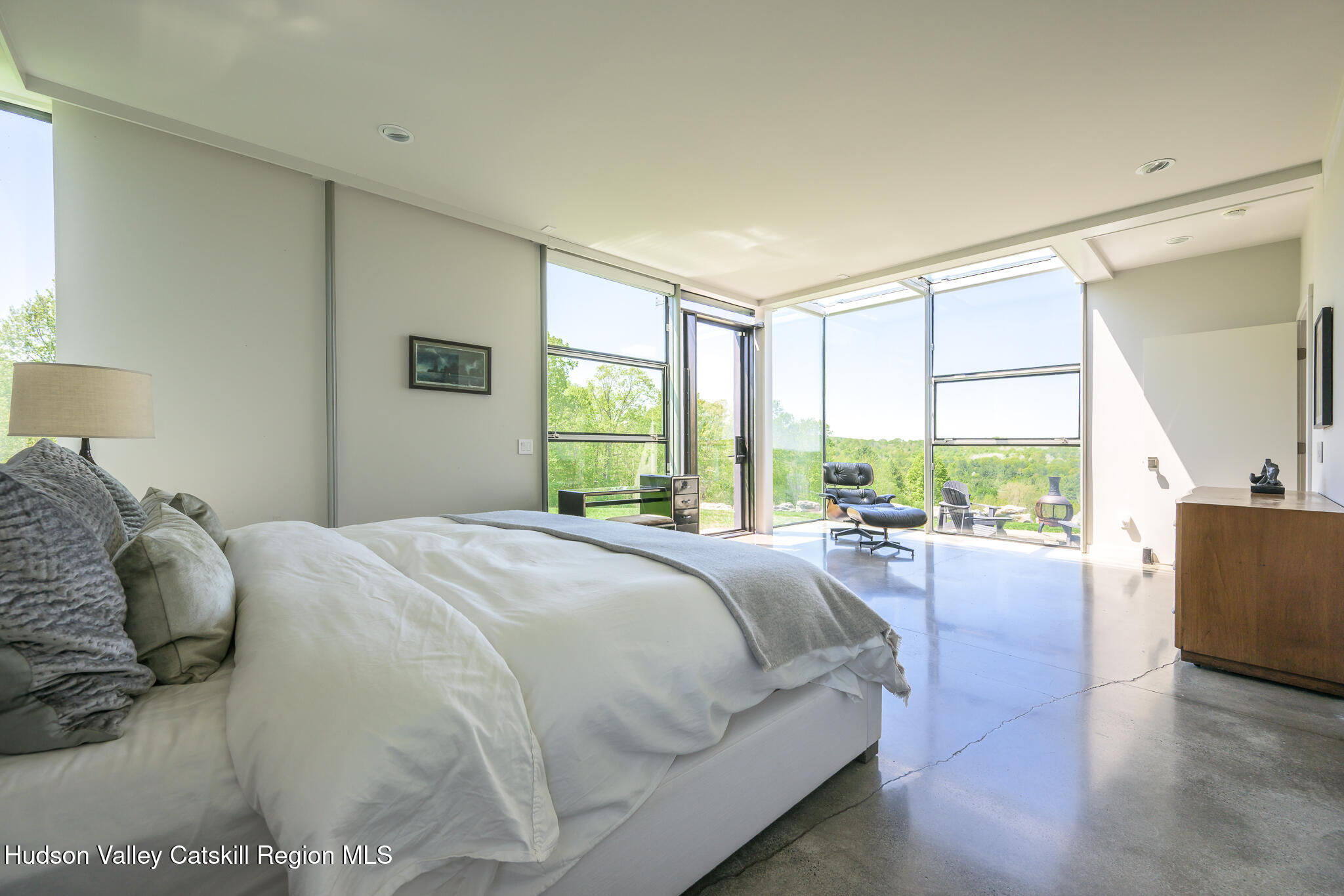 837 Carlson Road Craryville, NY 12521 - Photo 27 of 65 a bedroom with a bed and a large window