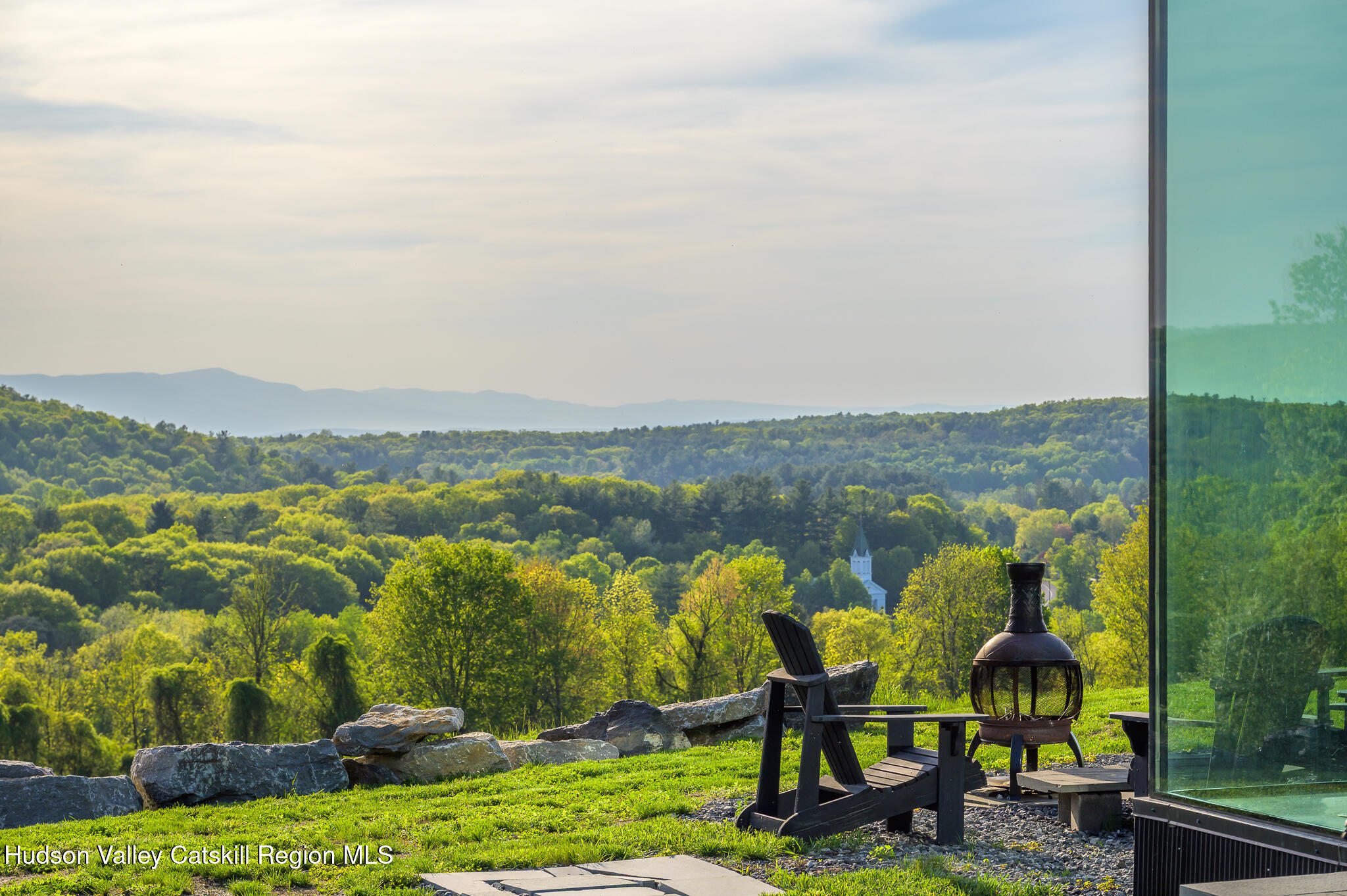 837 Carlson Road Craryville, NY 12521 - Photo 29 of 65 a view of a lake with a mountain in the back