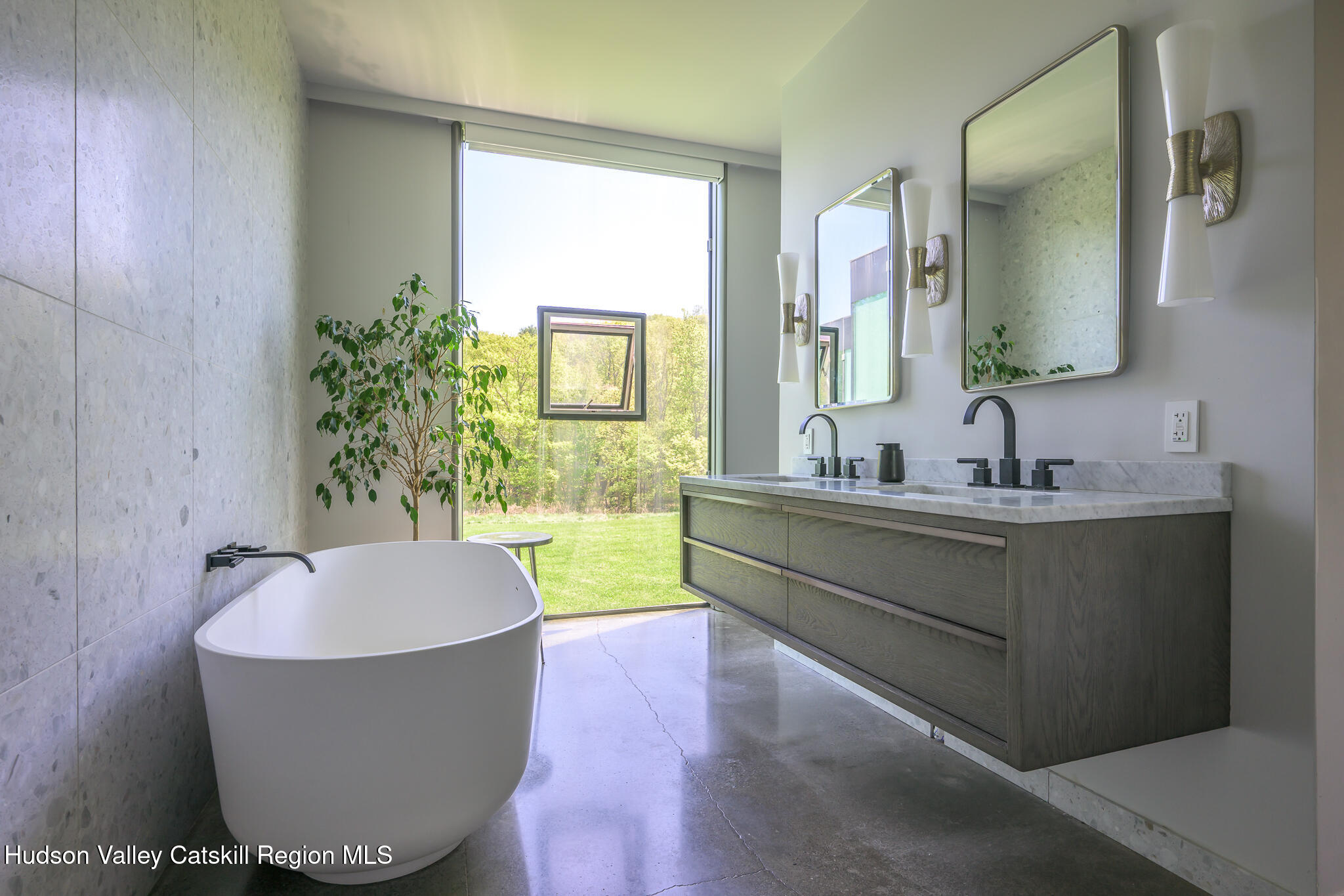 837 Carlson Road Craryville, NY 12521 - Photo 30 of 65 a bathroom with a tub a sink and a mirror