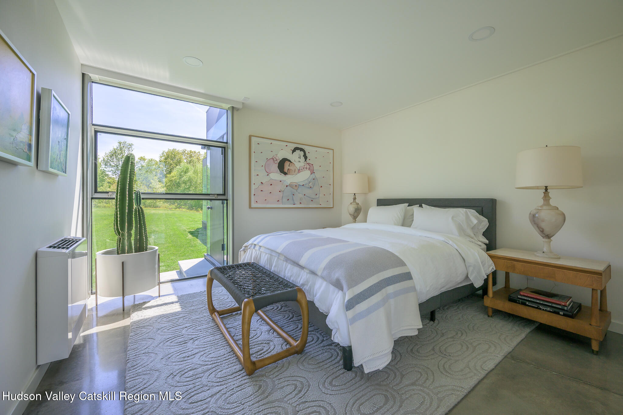 837 Carlson Road Craryville, NY 12521 - Photo 36 of 65 a bedroom with a bed and a window