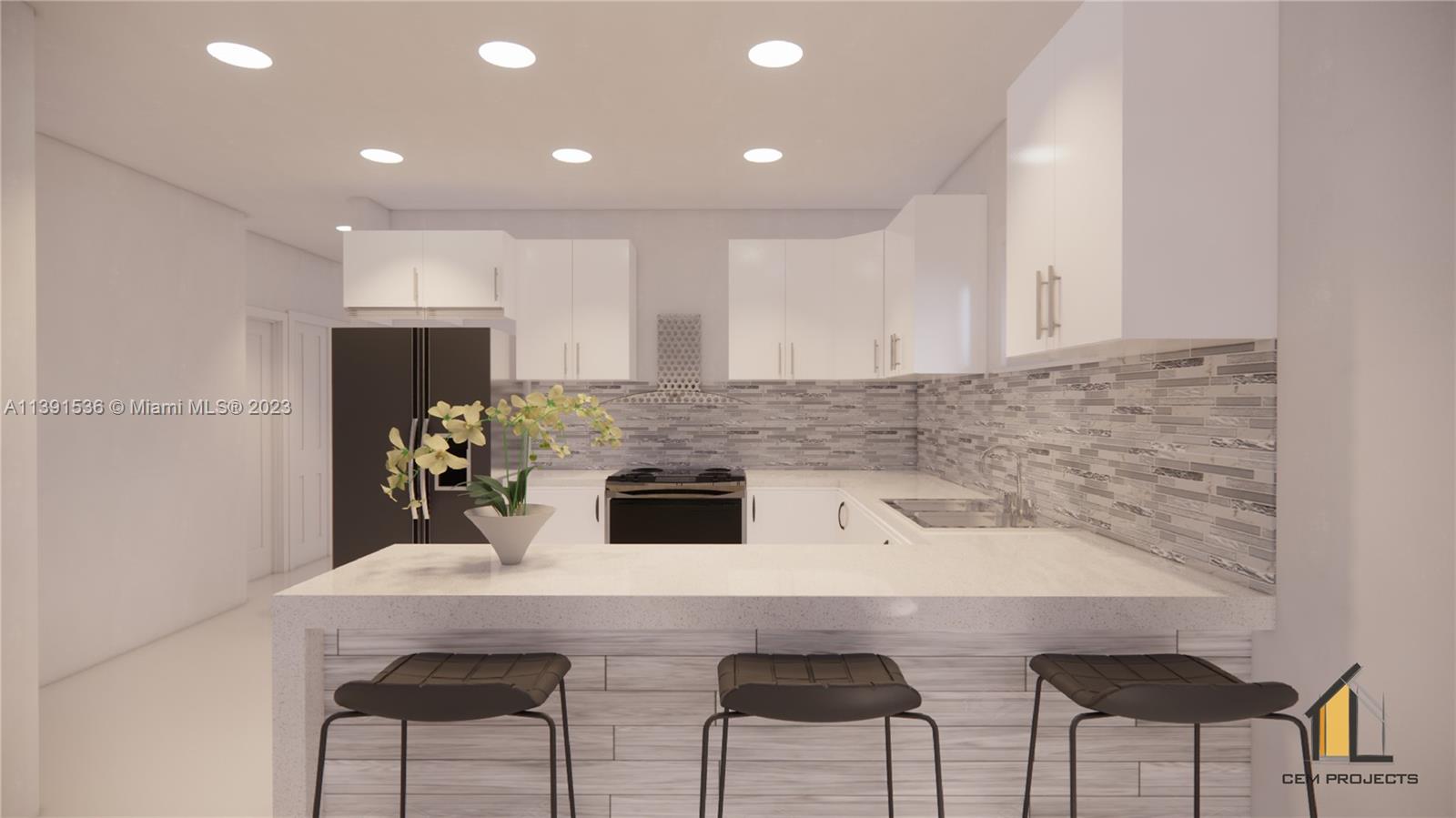 West Little River Miami, FL 33147 - Photo 3 of 5 a kitchen with a table and chairs in it