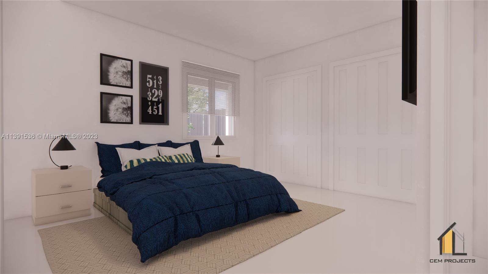 West Little River Miami, FL 33147 - Photo 5 of 5 a bedroom with a bed and painting on the wall