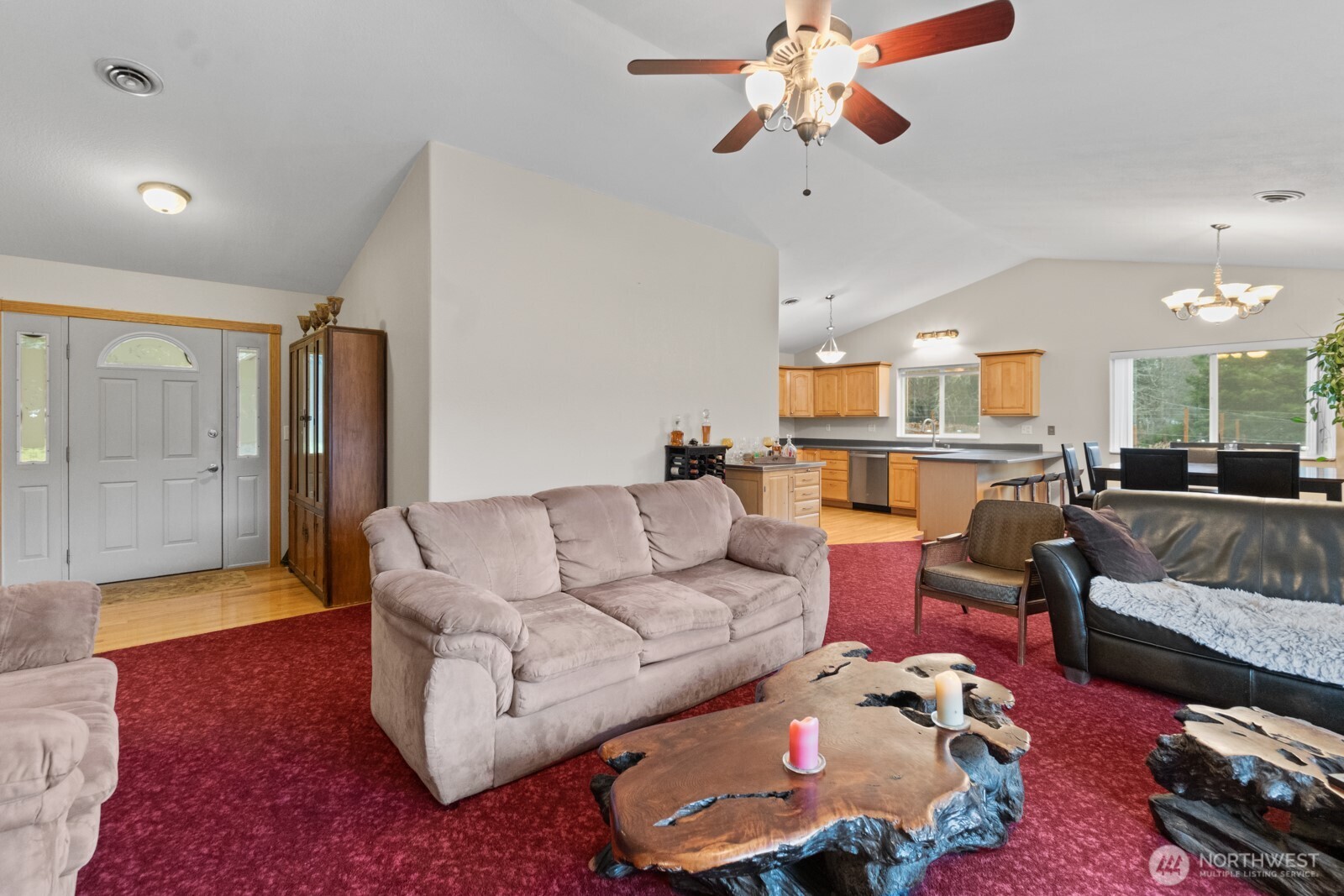 244 Martin Road Glenoma, WA 98336 - Photo 16 of 39 a living room with furniture and a chandelier